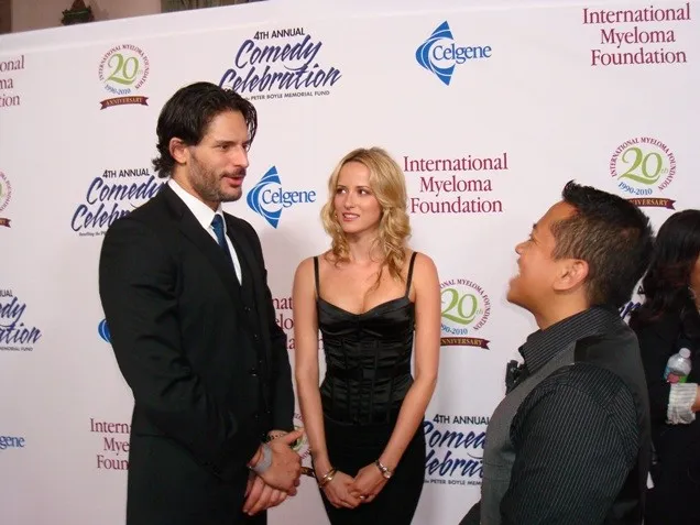 Joe Manganiello, True Blood's Alcide Herveaux with fiance Audra Marie, chat with with Rembrandt Flores at a charity function.