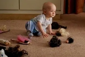 Baby Mikey w/decapitated Barbies