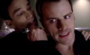Billith (Stephen Moyer) gets close to Ben (Robert Kazinsky) in HBO's True Blood Season 6, Episode 5, entitled 'F*ck the Pain Away'